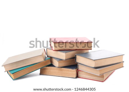 Stack of vintage books isolated on white background