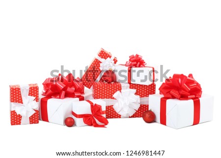 Gift boxes with christmas baubles isolated on white background