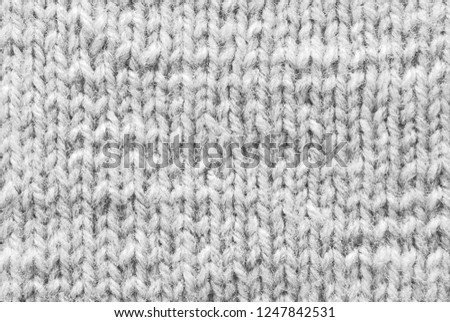 Gray knitted pattern as background
