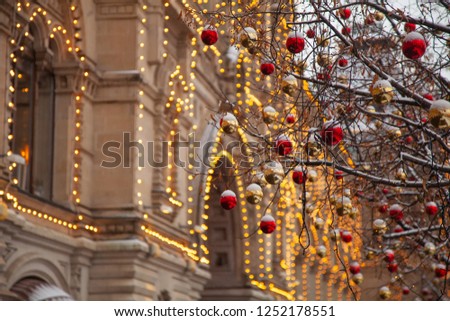 cozy streets of the big city, decorated with light bulbs and decorations for the new year