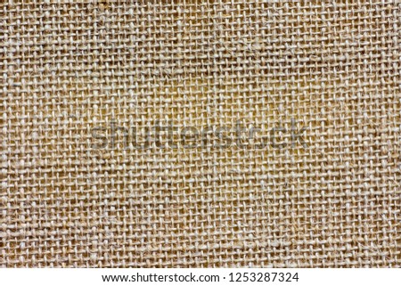 Sackcloth texture background.
Rustic jute sackcloth fabric for pattern.
Knit hemp rope natural texture. 
top view.