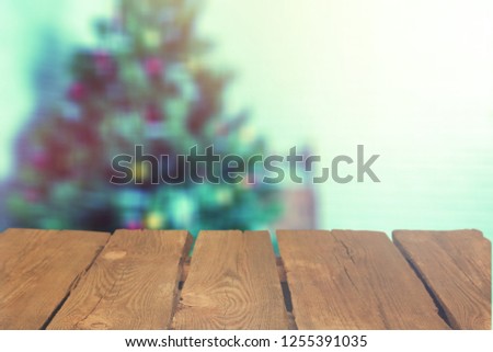 wooden destroyed table by the Christmas tree