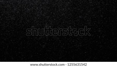 Snowfall on a black background. 3D rendering