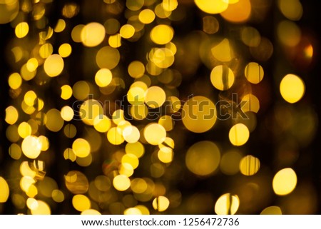 abstract gold bokeh light background with soft blur effect for background and wallpaper Christmas