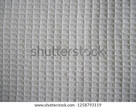 Natural textile backdrop in white tones                               