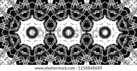 Black and white kaleidoscopic horizontal pattern for backgrounds and design