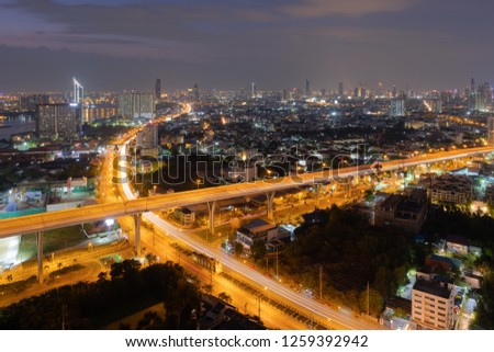 Night view of highway in Bangkok City downtown cityscape urban skyline Thailand