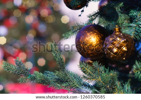 Christmas toys in the form of balls on the tree for the new year