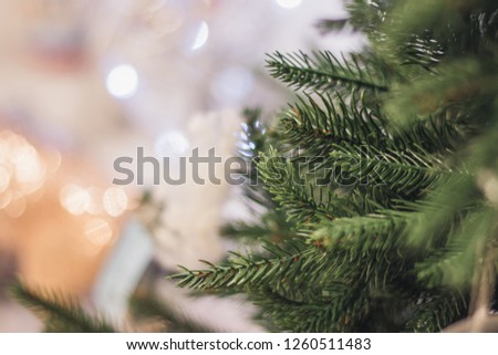 Christmas tree background and Christmas decorations, blurred, sparkling, glowing. Happy New Year and Christmas theme