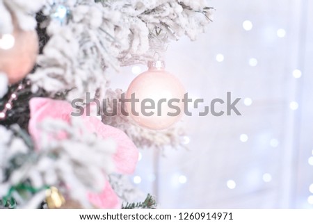 Vintage Christmas background with Christmas decoration on tree. Different decorations for a Christmas tree, defocused 