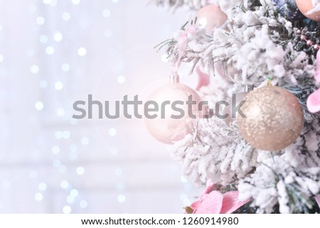 Vintage Christmas background with Christmas decoration on tree. Different decorations for a Christmas tree, defocused 