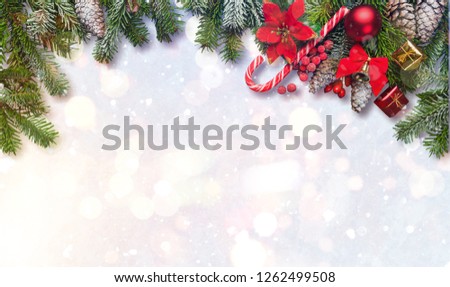 Christmas background with frosted fir tree, copy space and decor