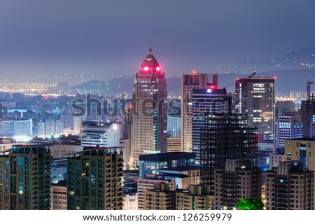 Urban scenery with skyscrapers and apartments in night, Taipei, Taiwan.