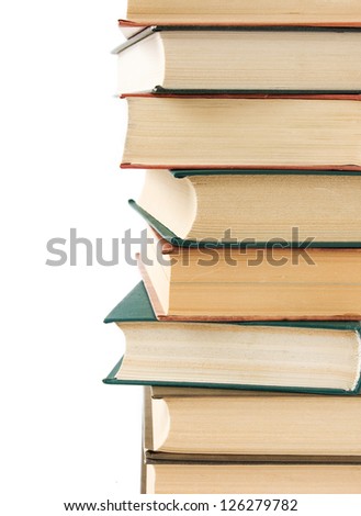 Stack of old antique books isolated on white background