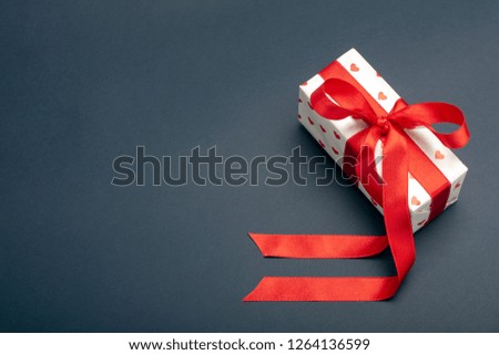 Gift to Valentine's Day with heart and packing tape. Isolate on white background