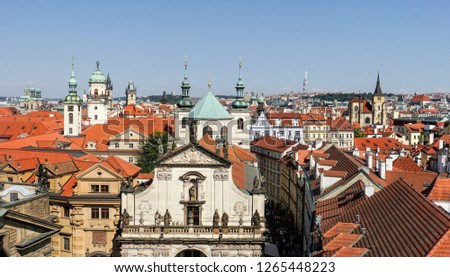View from the tower of Charles Bridge on the Salvator church and the old town of Prague