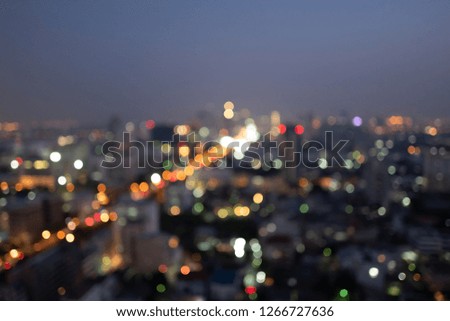 Abstract blur image of the city with bokeh at night.