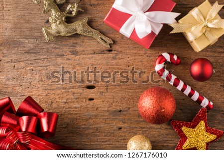 gift box with Christmas on wooden background