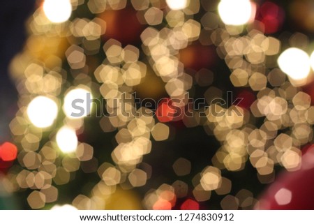 Beautiful bokeh light in city during festival moment. Blurred and defocused light in twilight in the Christmas and New Year celebration. Sweet romantic scene for background.