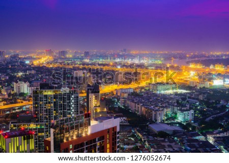 Aerial view of central business district,  commercial and residential area at night of Bangkok, Thailand