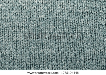 blue gray black wool threads in the fabric