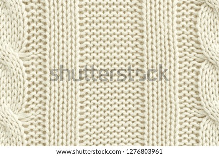 White Knitted Wool Background With Visible Details

