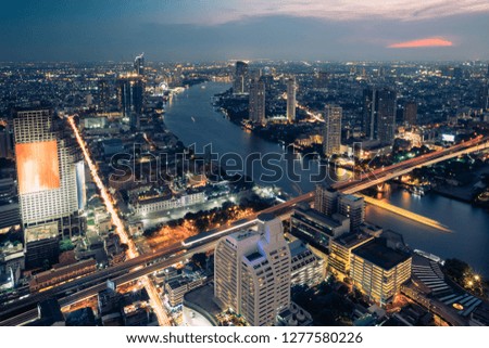 Top view of the skyline of Bangkok and the river at night - long exposure