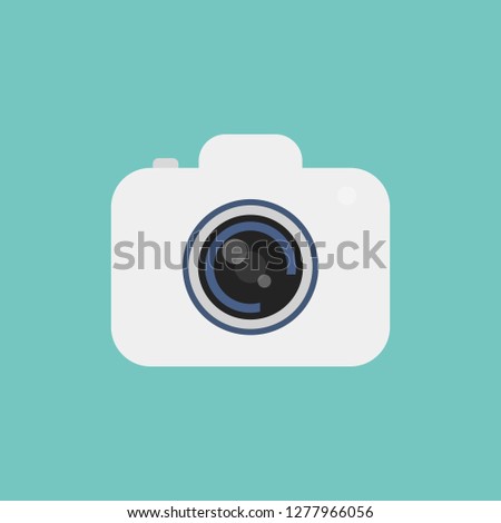 Flat icon camera isolated on turquoise background. Vector illustration.