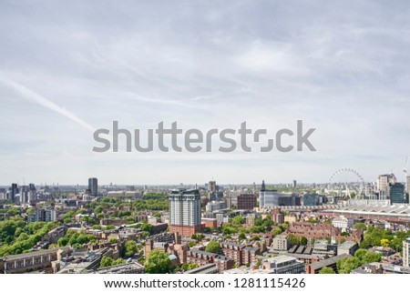 cityscape of london elevated position urban architecture blue sky clouds