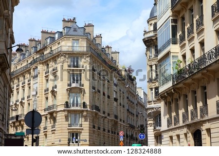 Paris, France - typical old apartment buildings. Windows and balconies.