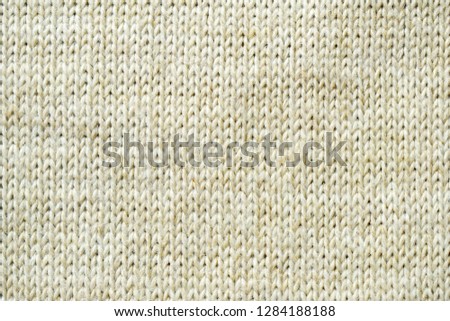 Grey knitted background. Surface wool texture. Copy space for your text