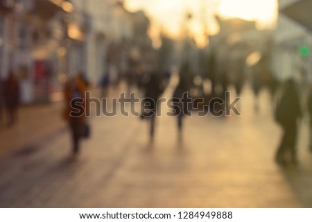 City commuters at sunset. Blurred background image for business, modile apps, and other uses.