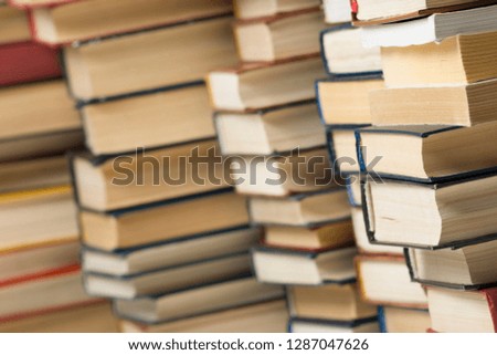Stack of books background. many books piles