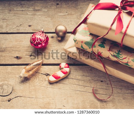 Christmas presents with red ribbon/toned photo