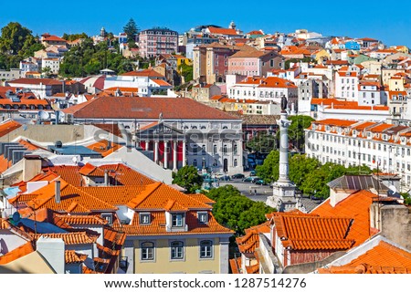 Aerial skyline view of Lisbon old town, Portugal. Rossio Square and Pombaline downtown of Lisbon (Lisbon Baixa) on the background