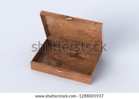 Dark wooden empty open long box or casket on white background. 3d illustration