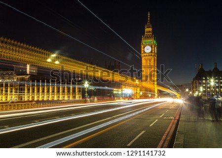 London Big Ben and traffic on Westminster Bridge in a beautiful summer night, London, England, United Kingdom