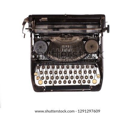 old black typewriter isolated on white background