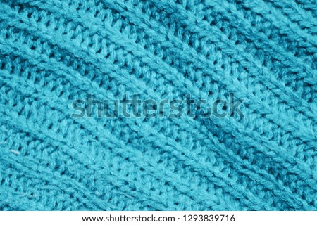 A texture of fabric. Knitted background.