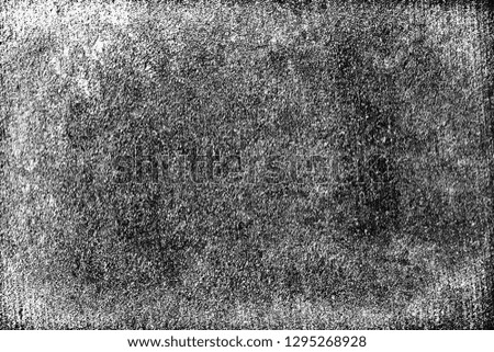 Grunge black and white background. Abstract monochrome texture. Surface in chips, cracks, scuffs