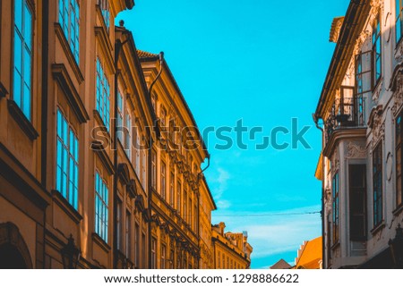 beautiful and colorful houses in a street at prague