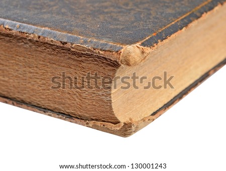 Ancient book close-up, isolated on white background. Selective focus