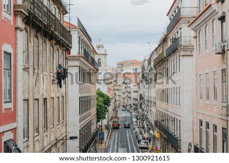 Streets of Lisbon with an old cable car