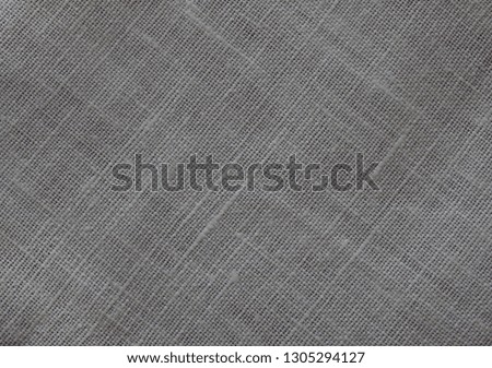 The texture of natural linen fabric. Background.