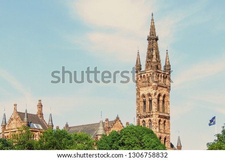 View of the University of Glasgow Gilbert Scott Building Tower Through Trees Gothic Architecture