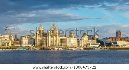 Liverpool Skyline St Johns Tower  Cathedral.. The Three Graces the Royal Liver Building. The Cunard Building.  former offices of the Mersey Docks and Harbour Board.  River Mersey.
