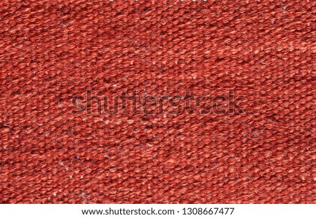 abstract fabric texture, used as background. red weave material