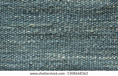 abstract fabric texture, used as background. blue weave material
