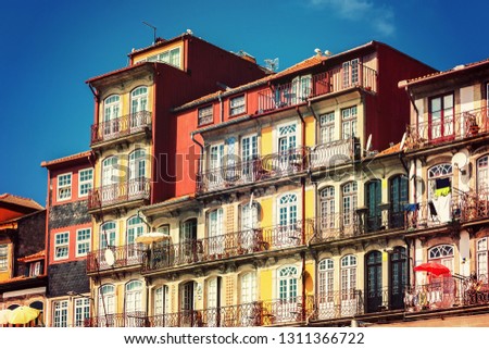 Historic house facade in the old town Foz Velha of Porto on the banks of the Douro River in warm sunlight