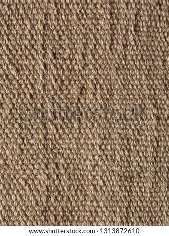 Abstract fabric texture, used as background. brown weave material